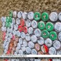 Nigerian Innovator Turns Waste Bottle Caps Into Solution for Damp Walls